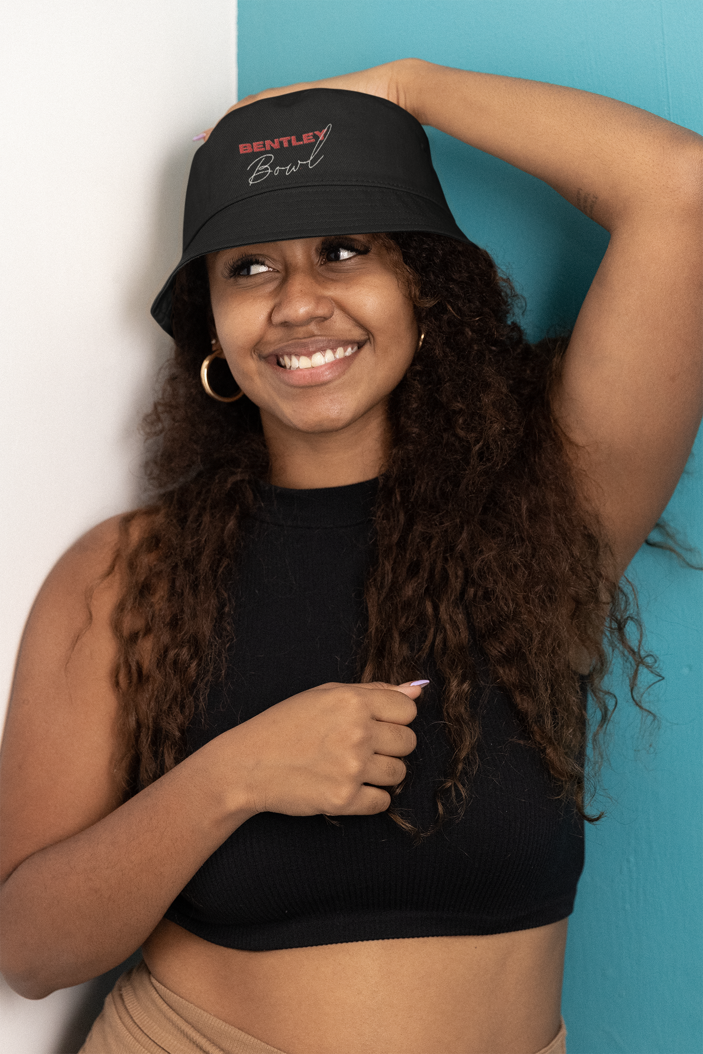 files/mockup-of-a-happy-woman-wearing-a-bucket-hat-m28772.png